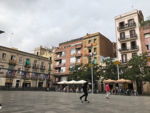 Man on skateboard in morning at Plaça del Sol in Barcelona