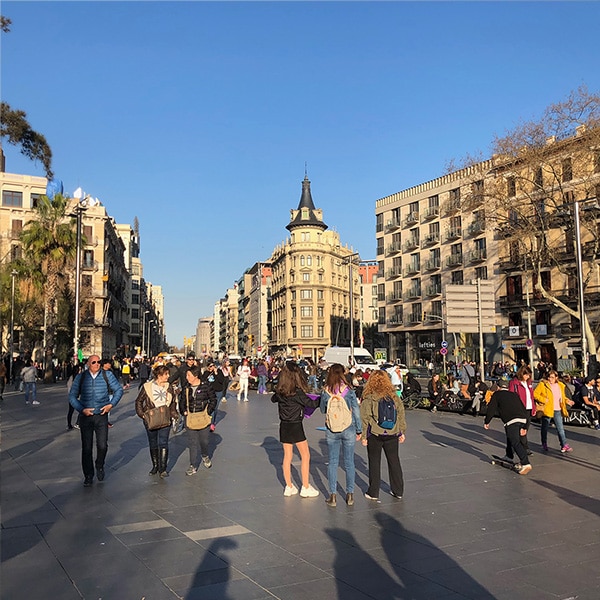 Late afternoon view of Plaça de la Universitat in Barcelona's eixample neighborhood.