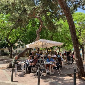 People dining on Plaça del Nord Barcelona