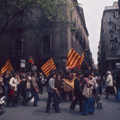 Barcelona citizens bearing Catalan flags in the 1970s
